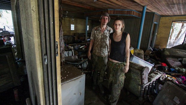 BRISBANE. NEWS. BRISBANE TIMES.
Photograph taken by Michelle Smith on Friday 14th January, 2011.
Paul and Sarah Smith in their flood affected rental home on Brisbane Terrace, Goodna.