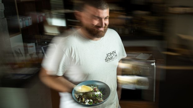 Josh Folden of Waterloo cafe John Smith with his Avocado and Goats Cheese on Sourdough Toast. 