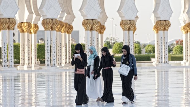 Photo three: Local girls inside the Grand Mosque.
