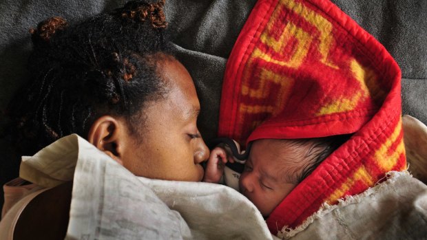 A mother with her baby in the maternity ward of the Goroka hospital in 2009. 