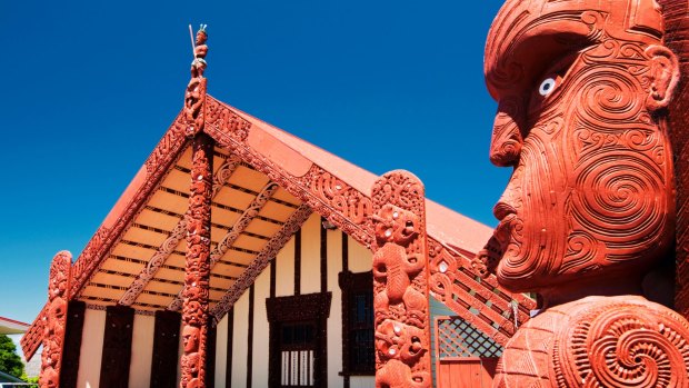 Wood carving outside of Te Papaiouru Marae, a Maori meeting house in Rotorua.