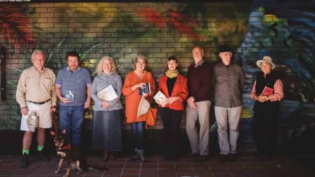 It's been one year since the ACAT tribunal retired to consider their appeal against the redevelopment of a Dickson car park into a Coles supermarket and apartment complex. From left, John Carroll, Denis O'Brien, Rosemary Urquhart, Robin d'Arcy, Jane Goffman, Ron Brent, Paul Costagan, and Jacqui Pinkava. 