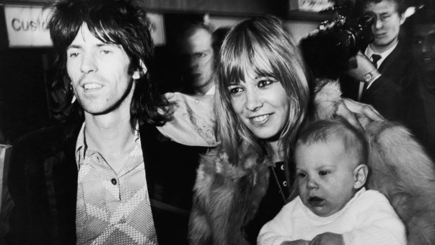 Rolling Stones guitarist Keith Richards with girlfriend with Anita Pallenberg and their son, Marlon, at London Airport (now Heathrow) in 1969.