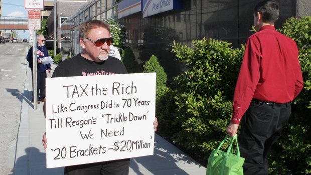 The suspected assailant, James Hodgkinson, pictured in 2012 protesting outside of the United States Post Office in Downtown Belleville, Ill.