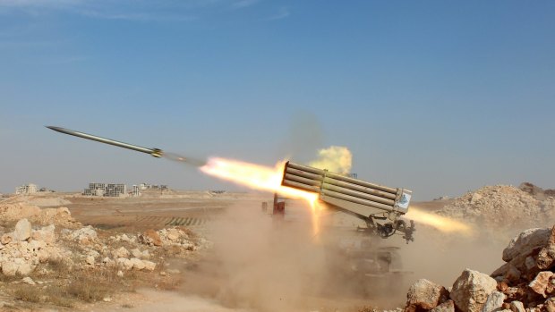 Syrian rebels launch missiles against Syrian government forces near Aleppo.