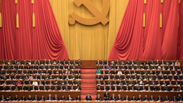 Chinese President Xi Jinping, centre, presides over the opening ceremony of the 19th Party Congress in Beijing.