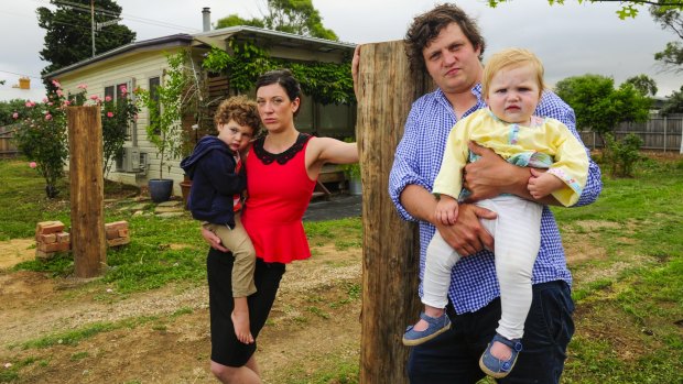 Bungendore Fluffy house owners Eddie Casey and and partner Dale Freestone with their children Leon, 3, and Grace, 1. Mr Casey gave a submission to the NSW inquiry.