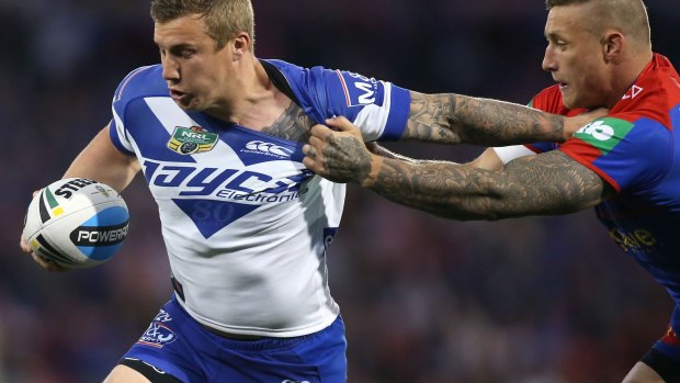 Finals doubts:  Canterbury's Trent Hodkinson left the field with an arm injury in the 20-18 win over the Newcastle Knights.