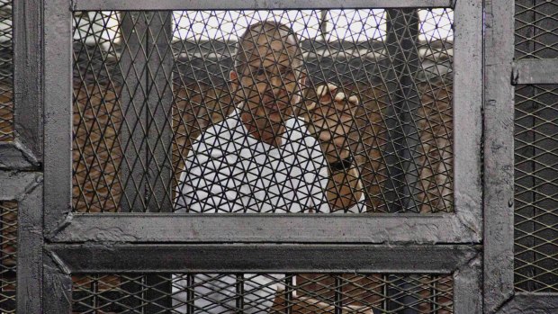 Al-Jazeera journalist Peter Greste in a Cairo courtroom in May 2014.