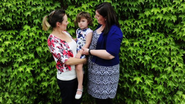 Jocelyn Williams with her daughter, Elke, 3 and Jocelyn's sister-in-law Alex Conroy. The family are raising awareness of bowel cancer, which took the life of their husband, father and brother.