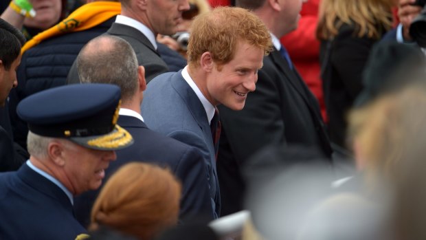 Prince Harry greets people before the Lone Pine service.