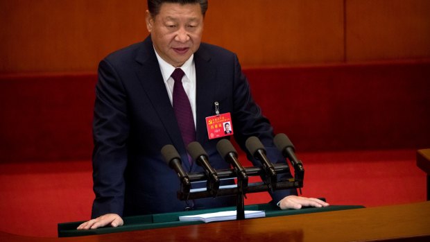 Chinese President Xi Jinping delivers his speech.