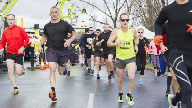 Emergency services personnel start the 2016 Darren Wall Fun Run on Wednesday morning.