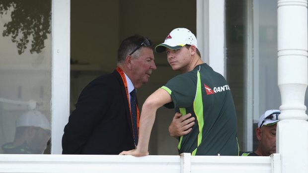 Caught unawares: Rod Marsh and Steve Smith.
