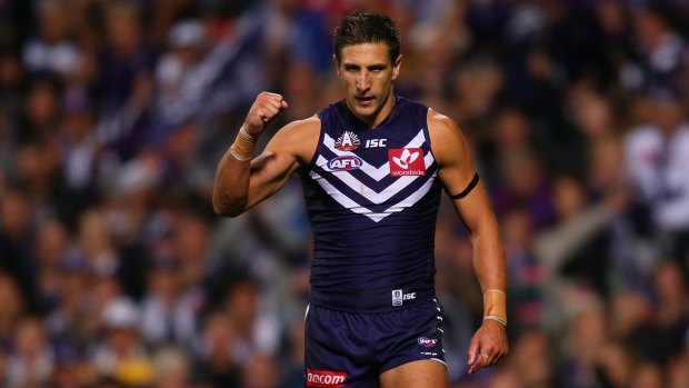 Matthew Pavlich of the Dockers celebrates a goal against Sydney.