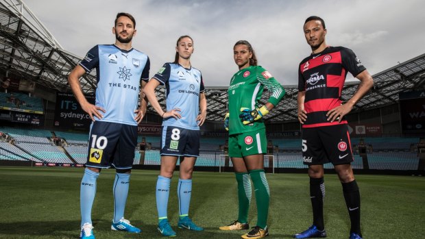 Derby day: Milos Ninkovic and Amy Harrison (Sydney FC) and Jada Whyman and Kearyn Baccus (Western Sydney Wanderers)  pose for a photograph in the lead-up to Saturday's historic double header.