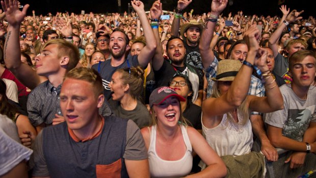 Fans listen as Mumford & Sons perform during the show that concluded the Gentlemen Of The Road Stopover festival.