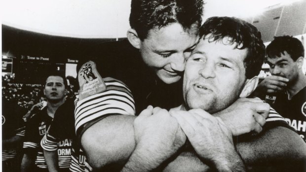 Royce Simmons and Mark Geyer celebrate their 1991 grand final victory.