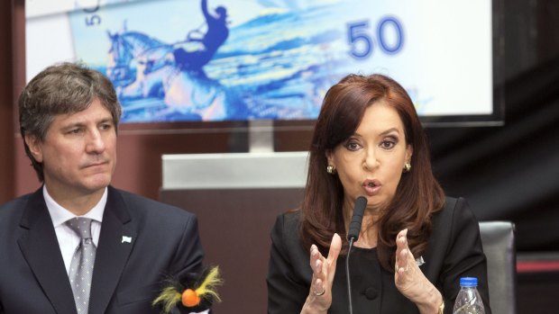 Argentina's President Cristina Fernandez speaks next to Vice-President Amado Boudou during a ceremony at Casa Rosada presidential palace last year on the 32th anniversary of the start of the Falklands War.