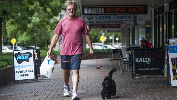 Graham Coddington of Kingston with his spoodle Toby. He agrees Canberra is a dog-friendly city.
