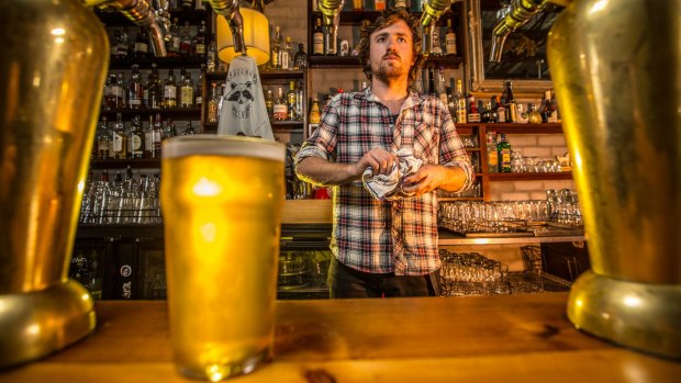 Thomas Moloney, a barman at the Raccoon Club in Preston, which is boycotting CUB beers.
