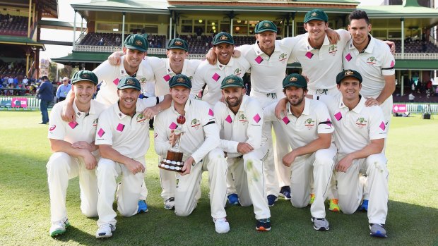 Victorious: The Australian team pose with the Frank Worrell Trophy.