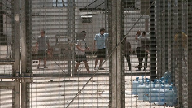 Asylum seekers at the Manus Island detention centre. Ferrovial has said it won't retender for the offshore detention contracts.