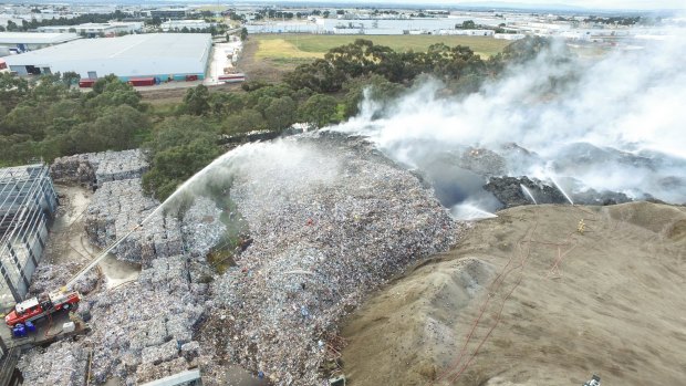 The fire at the SKM recycling plant in Coolaroo is still smouldering. 