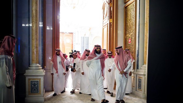 Crown Prince Mohammed bin Salman, centre, arrives at the Future Investment Initiative in Riyadh, Saudi Arabia on  October 23.