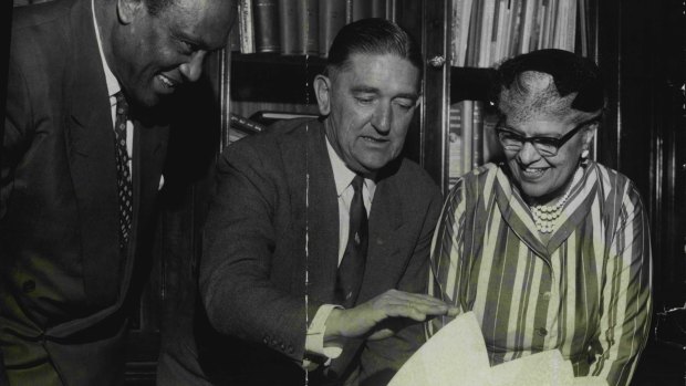 Paul Robeson, his wife Eslanda and Mayor Jensen inspect a model of the Opera House on November 8, 1960.