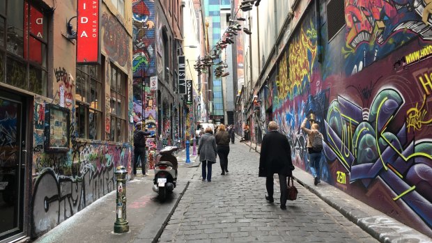 Melbourne's Hosier Lane has become a tourist attraction due to its street art. 'We have not taken that approach,' says Brisbane Lord Mayor Graham Quirk.