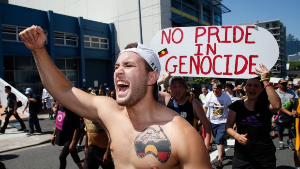 A man shouts during a protest against treatment of Aboriginal Australia.