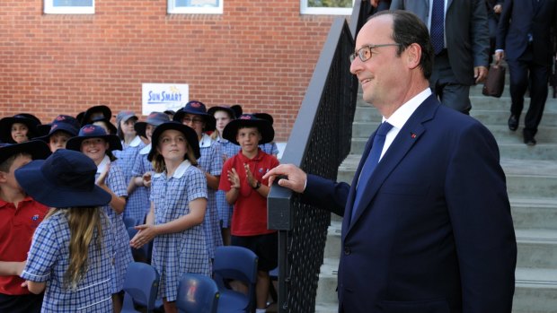 Bonjour: Francois Hollande arrives to deliver a speech at the French Australian School, Telopea Park. 