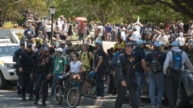 Protesters swell on the first official day of G20 in Brisbane.