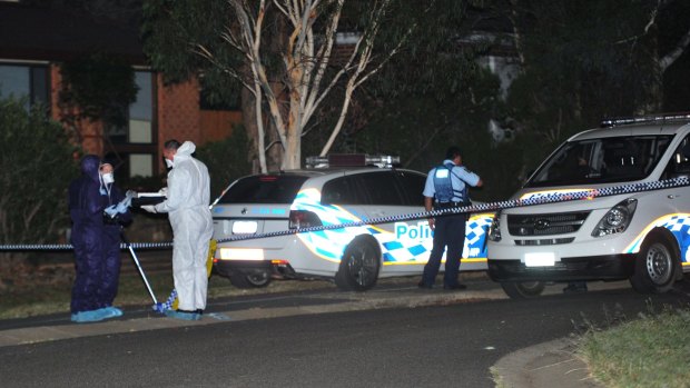 Police cordoned off the area near the McWhae Circuit home in  Wanniassa. 