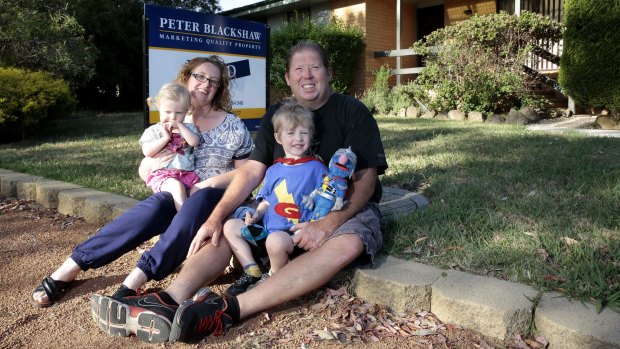 Moving on: Chris and Charmaine Sims with their son Zac and daughter Alma. They are leaving Mr Fluffy behind after buying a new home in Kambah in the ACT. 