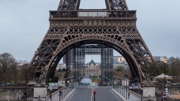 Eiffel Tower says 'Merci' (thankyou) to healthcare workers fighting coronavirus.