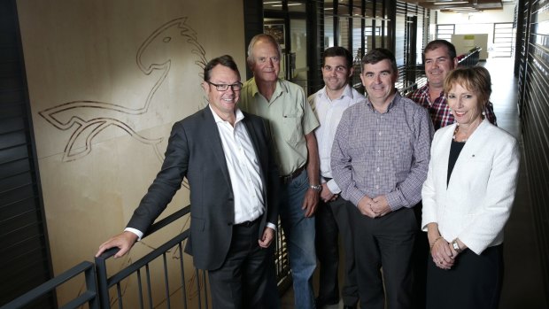 Robert Kennedy, left, has called for unity among the Brumbies board members. He is pictured with Geoff Larkham, Angus McKerchar, John Gillespie, Peter Callaughan and Carmel McGreggor.