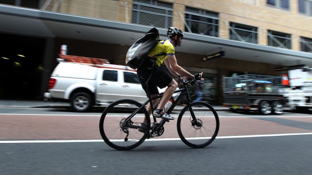 Part-time lane planned: A cyclist on Castlereagh Street. 