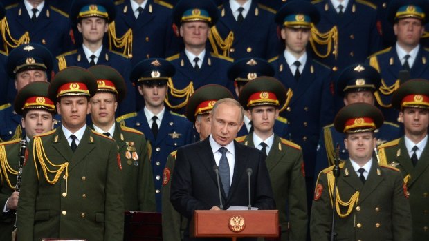 Russian President Vladimir Putin addresses the troops at an international military forum outside Moscow on Tuesday.