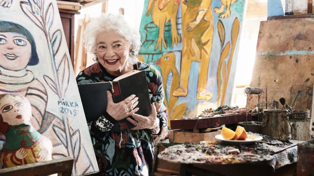 Mirka Mora in her studio in Richmond in August 2016, wearing the Gorman dress she helped design.