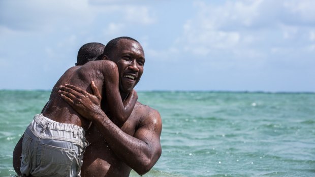 Mahershala Ali and Alex R. Hibbert in <i>Moonlight</i>.