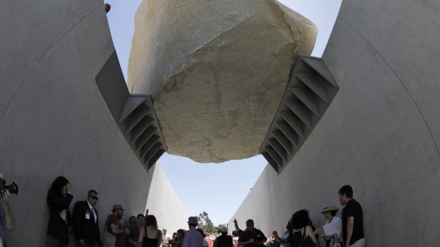 The Levitated Mass by artist Michael Heizer's exhibit features a 340-tonne megalith rock at the Los Angeles County Museum of Art in California.