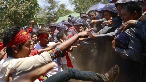 Police clash with student protesters in Letpadan, central Myanmar. 