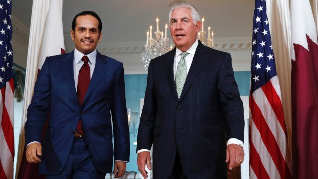 US Secretary of State Rex Tillerson, right, with Qatari Foreign Minister Sheikh Mohammed bin Abdulrahman al-Thani.