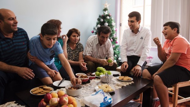 Last year, the Khaieo family was waiting for approval to come to  Australia as refugees. Now the  Christian Syrian family are spending their first Christmas in Australia.