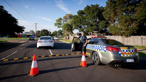 Police at the scene in Werribee on Sunday.