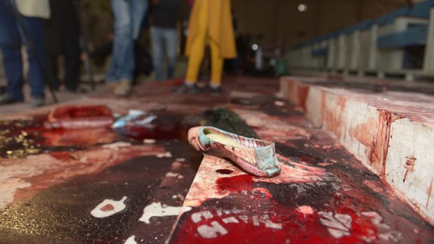 The bloodied ceremony hall at the school the day after the attack.