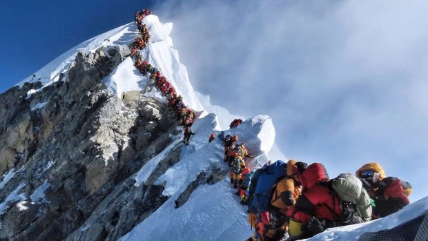 This photo showing climbers queuing to reach the summit of Everest went viral last month.