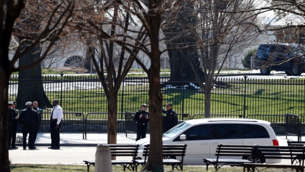 US Secret Service officers on Pennsylvania Avenue, near the White House, in Washington on Sunday.